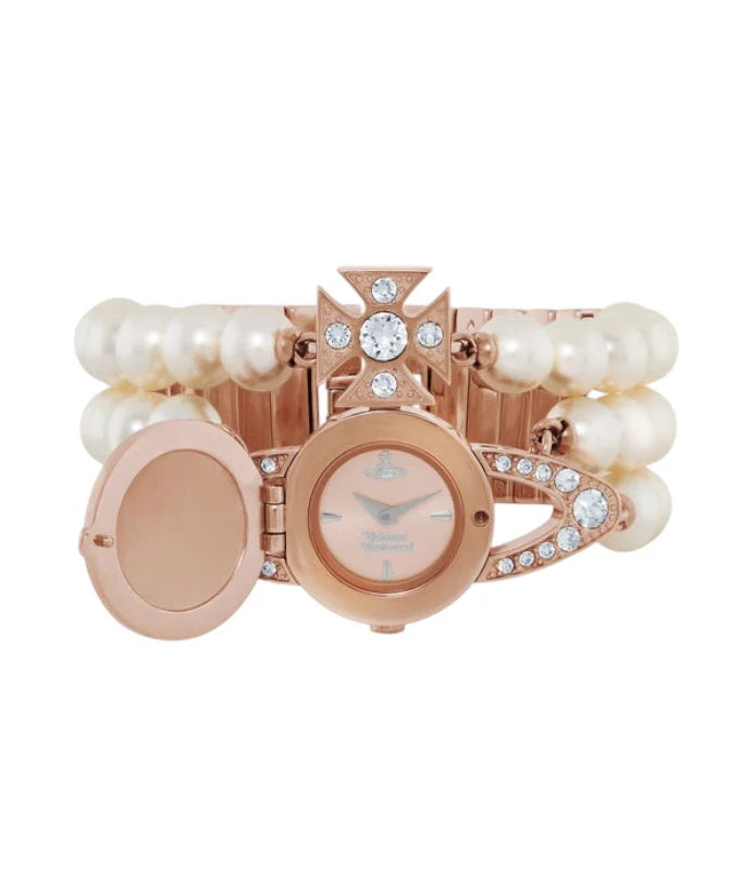 Reloj dorado con orbe de gemas y triple tira de perlas