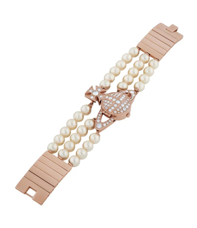 Reloj dorado con orbe de gemas y triple tira de perlas