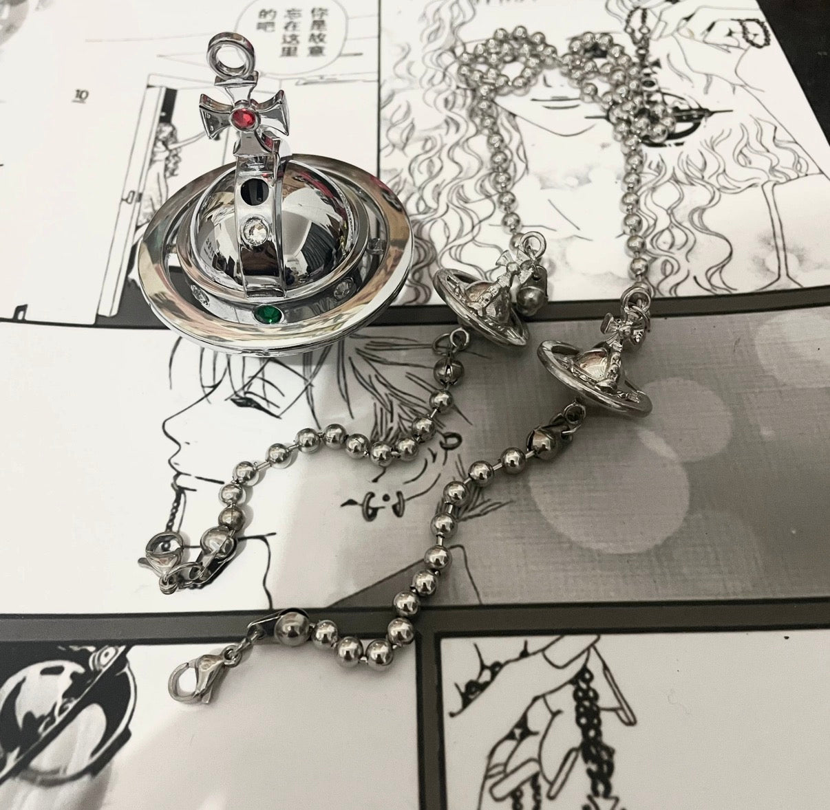 Collar con mechero Orb de Shin